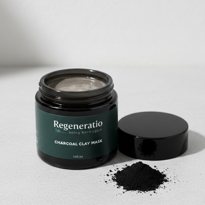 Open jar of Regeneratio charcoal clay mask for natural skincare