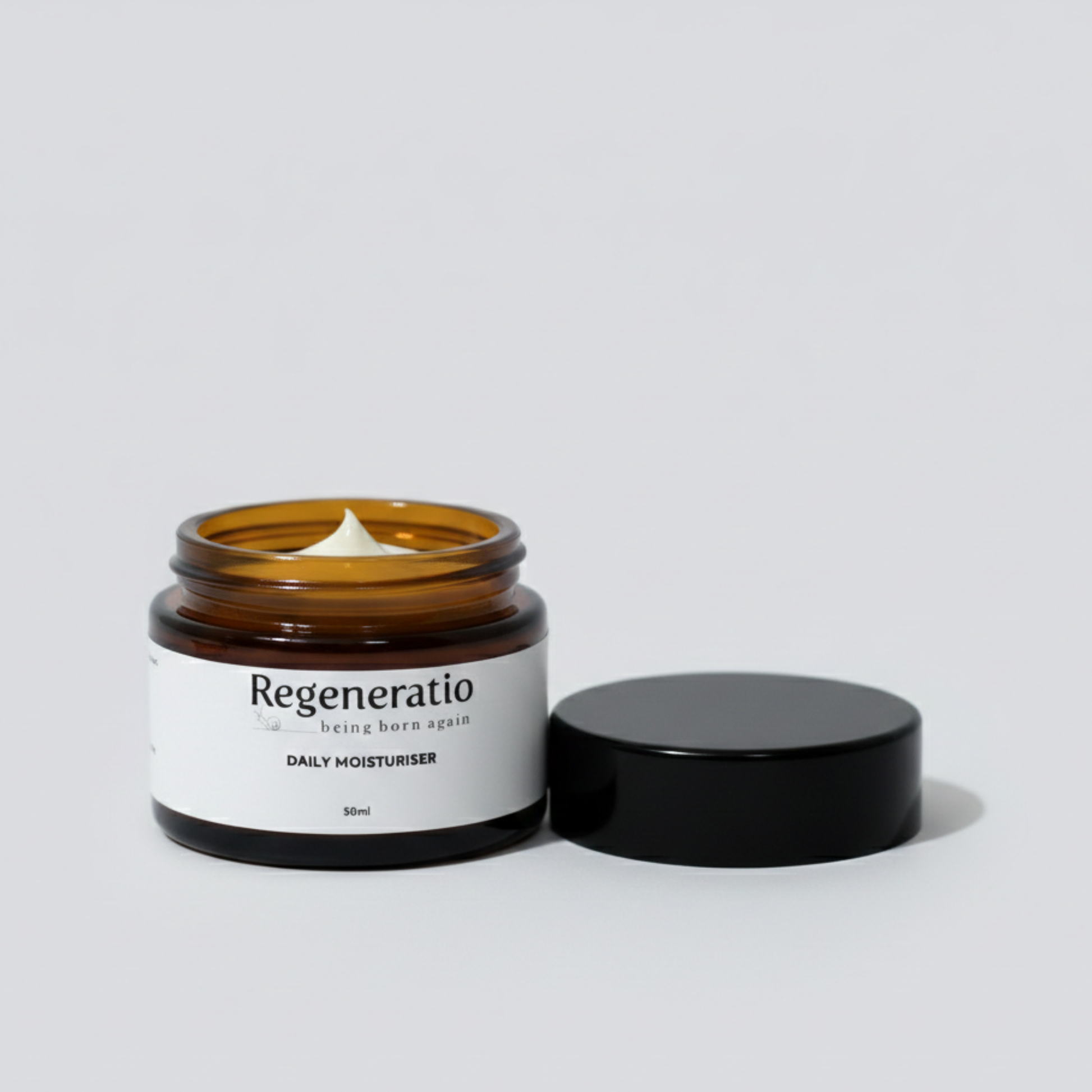 Open jar of Regeneratio daily moisturiser cream with snail mucin