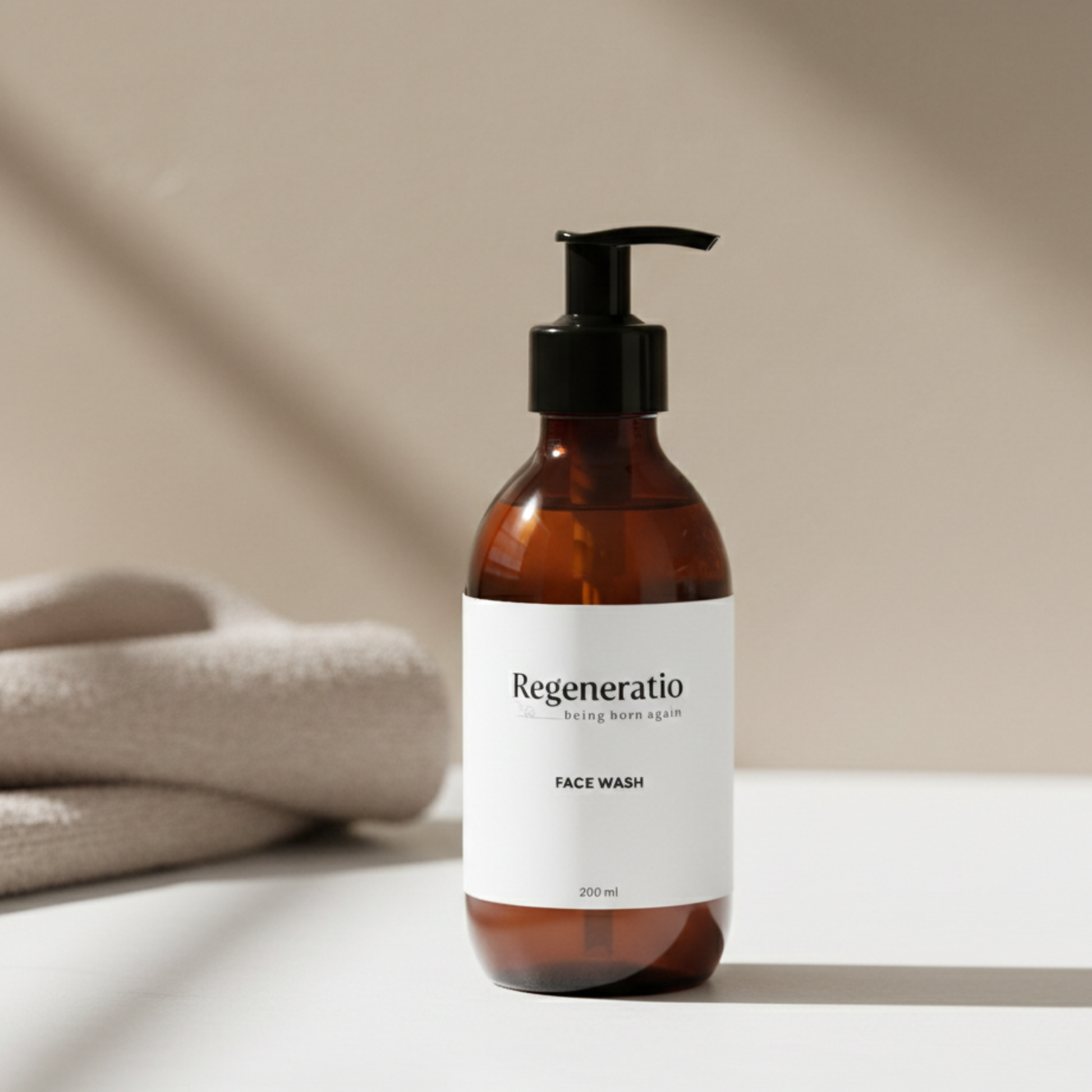 Regeneratio face wash cleanser next to towel for gentle cleansing